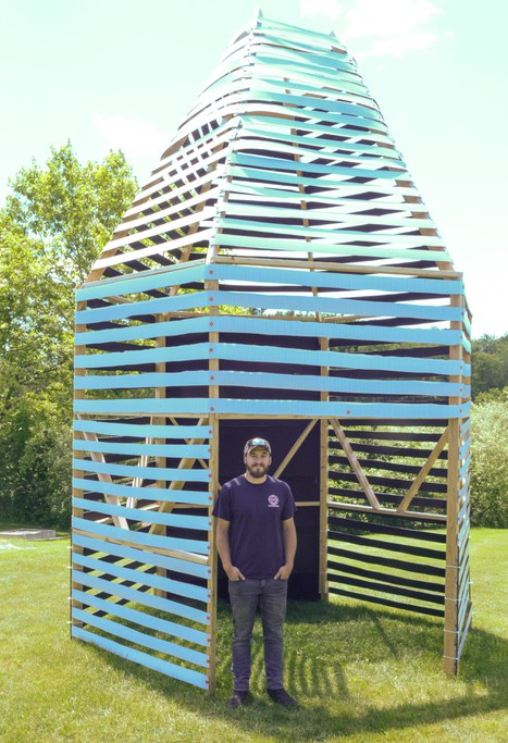 Rising senior, Matthew Poorman stands next to the 18-foot prototype “Bee Hut.” The pavilion design is modelled after old skeps, which were baskets used to house honey bees before Langstroth hives.