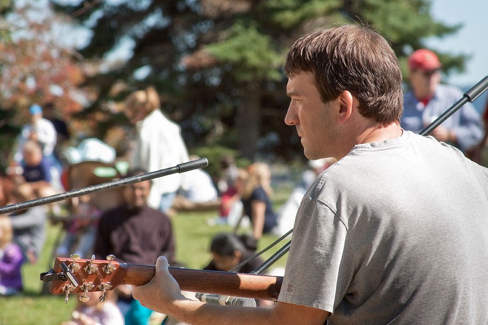 Many different Musicians performed for free at the Great Insect Fair on Saturday, Oct. 2, including Aaron Straley, seen here accompanying Andy Tolins. Photo by Nick Sloff