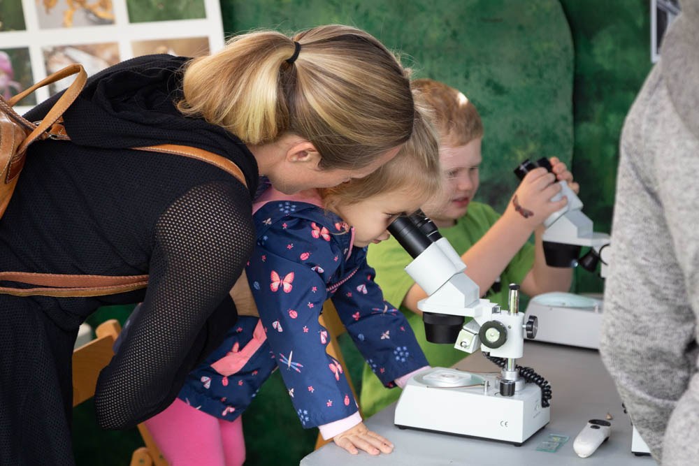 A mother and daughter enjoy displays at the annual Great Insect Fair