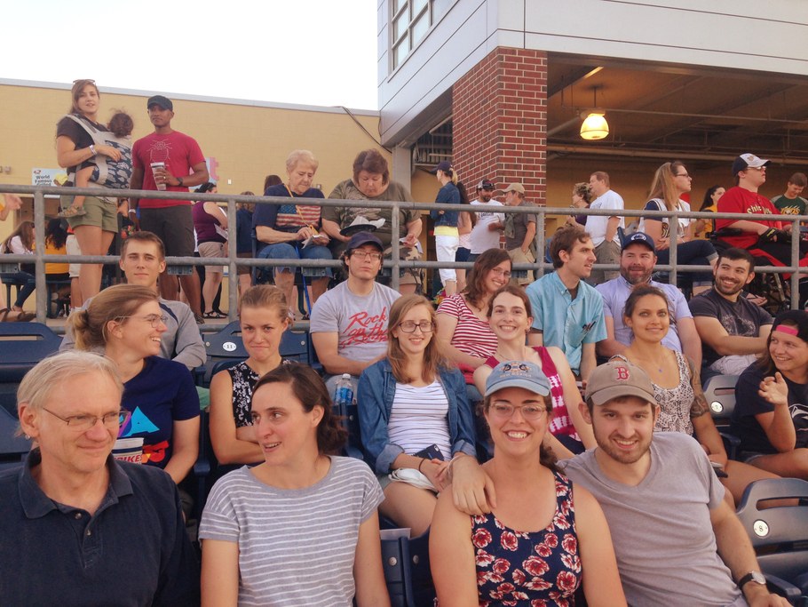Jared Ali and his family are in the back, judging us, but we are mostly happy to be at a baseball game, except Sarah who has gone to the angry face--truly a questionable decision!